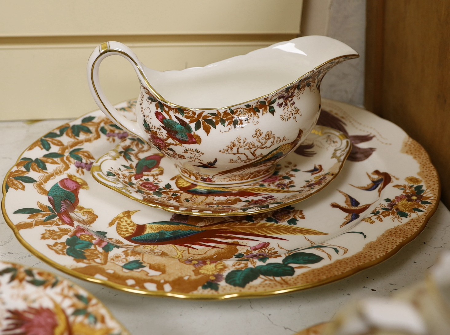 A Royal Crown Derby 'Olde Avesbury' part dinner service